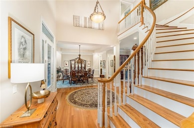 Foyer wiith sweeeping front stairway