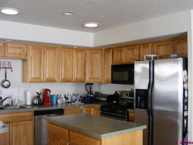 Main floor kitchen with all stainless steel applia