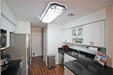 Updated kitchen with stainless appliances and gran