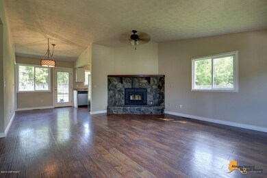 Living Room w/ Wood Fireplace