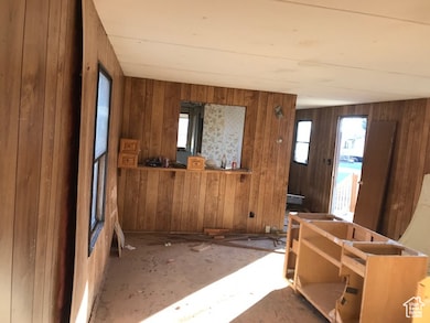 Misc room with wooden walls