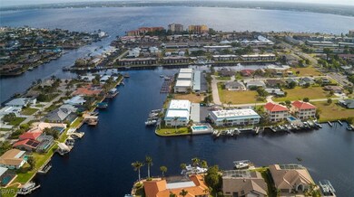 Bird's eye view with a water view and a residentia