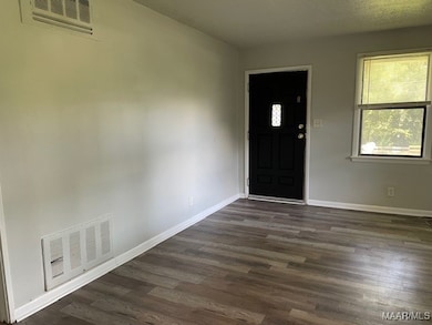 LARGE LIVING ROOM, WITH VINYL PLANK FLOORS THROUGH
