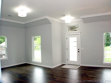 Natural light pours in through the multiple window