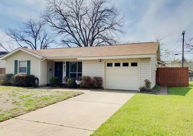 Single story home featuring an attached garage, dr