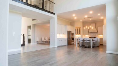 Open-concept living area seamlessly flows into the