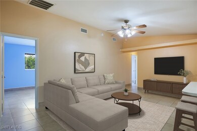 Tiled living room with vaulted ceiling and ceiling