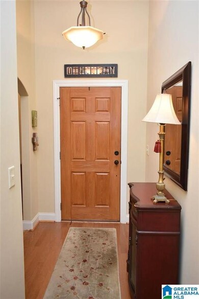 Welcoming entry with beautiful hardwood floors