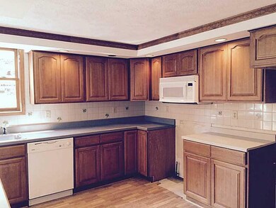 Kitchen. New cabinetry and flooring.