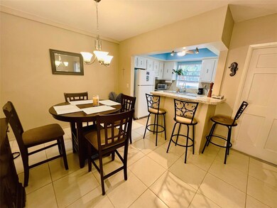 Dining room area with table that can extend seatin