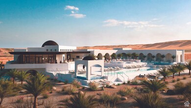 Community pool featuring a patio and a mountain view