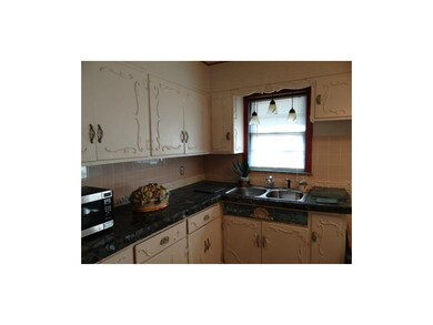 The Kitchen Counters & Decorative Cabinetry