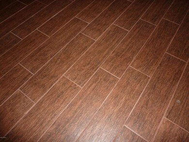 PORCELAIN WOOD PLANK FLOORING THROUGHOUT