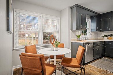 Kitchen with tasteful backsplash, dishwasher, and