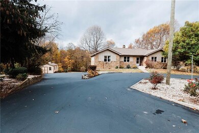 Pleanty of space for your guest to park, circular drive and check out the good size storage shed.