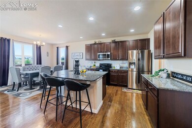 The Dining Room is located off the Kitchen making it easy for food service and clean up.