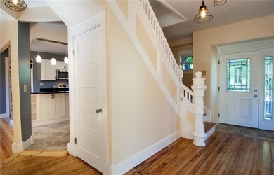 A grand view of the foyer and...