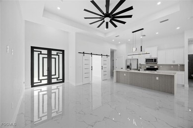 1261 NE 40th St, Cape Coral, FL 33909 - photo 6