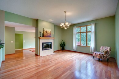 Large living room with tall windows and a beautifu