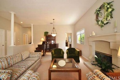 Living room opens up to a  Music area or formal di