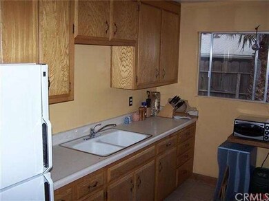 Another view of the kitchen. Window looks out to t