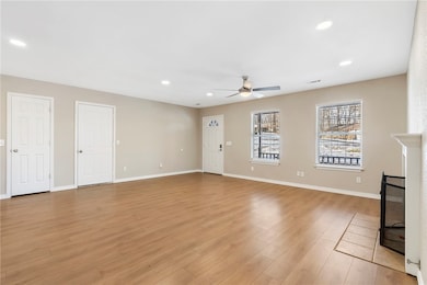 The inviting front porch leads into a welcoming li