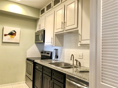 Modern kitchen with plenty of cabinets, stainless