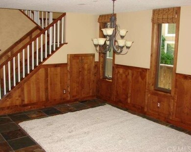 Front dining area w additional storage under stair