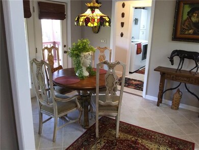 Kitchen seating area that leads to the first floor