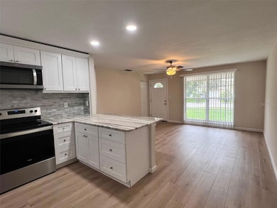 7020 Wentworth Way, New Port Richey, FL 34655 - photo 6