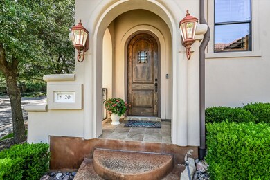 View of exterior entry with stucco siding