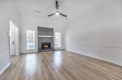 Unfurnished living room with light hardwood / wood