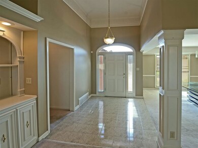 Stunning marble entry into an open,inviting home.