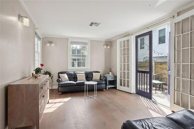 Living room with courtyard access.