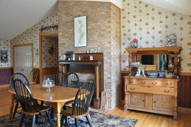 Wood Burning Fireplace in Dining Area