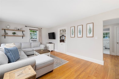Hardwood floors throughout and a charming built-in