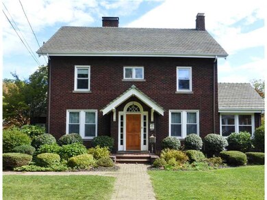 Exterior Front. Beveled glass in this covered Entr