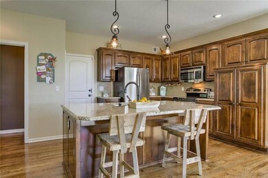 Large kitchen with beautiful cabinets.