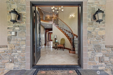 French doors welcome you to the grand 2 story entrance hall