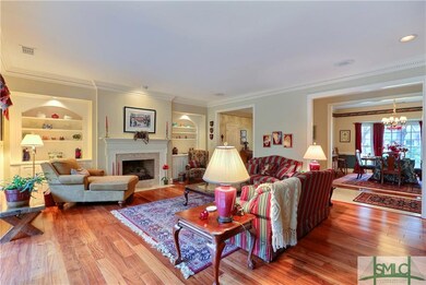 Gas fireplace and beautiful wood floors in the liv