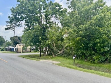 Frontage looking west toward corner