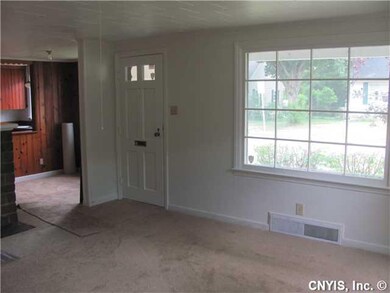Living Room. The new big picture window lets the l