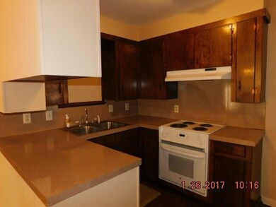 Kitchen features new stove/oven, range hood and gl