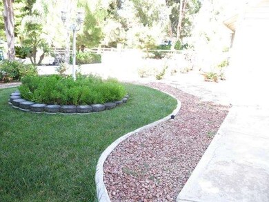 Great landscape and hardscape throughout this 1.3 