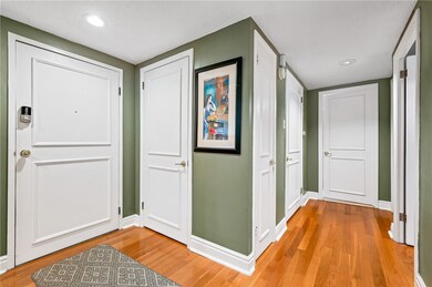 The wide entry opens into the unit with coat stora
