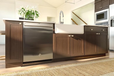 Kitchen island with apron front sink