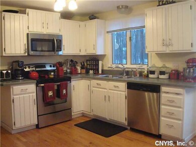 Kitchen. The kitchen offers new stainless applianc