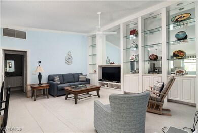 Living room with light tile patterned floors, crow