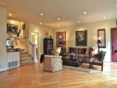 Living room looking toward downstairs bedroom/offi