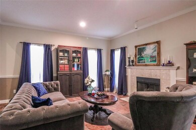 Formal living area with gas fireplace.